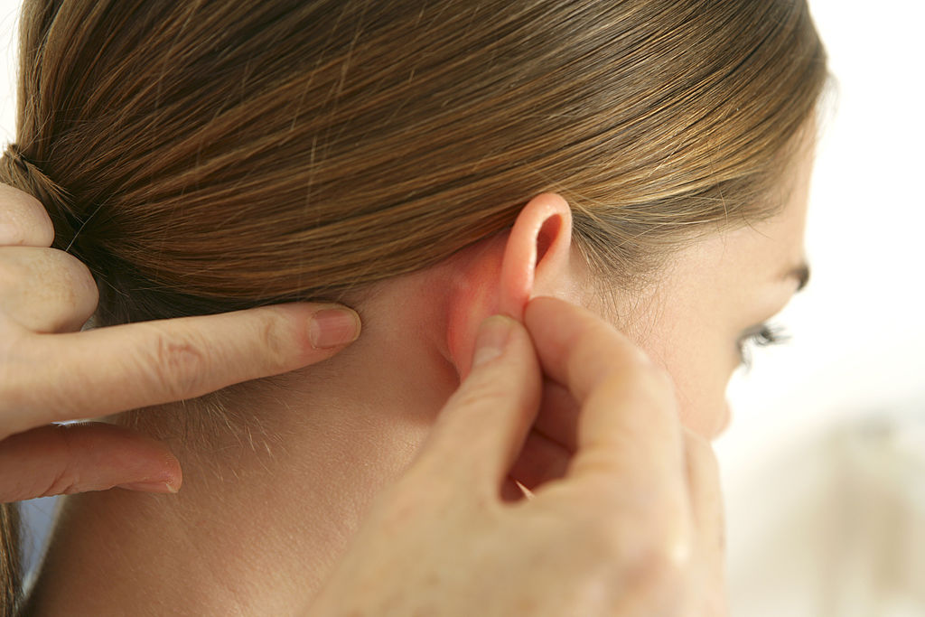 Iritație în spatele urechilor